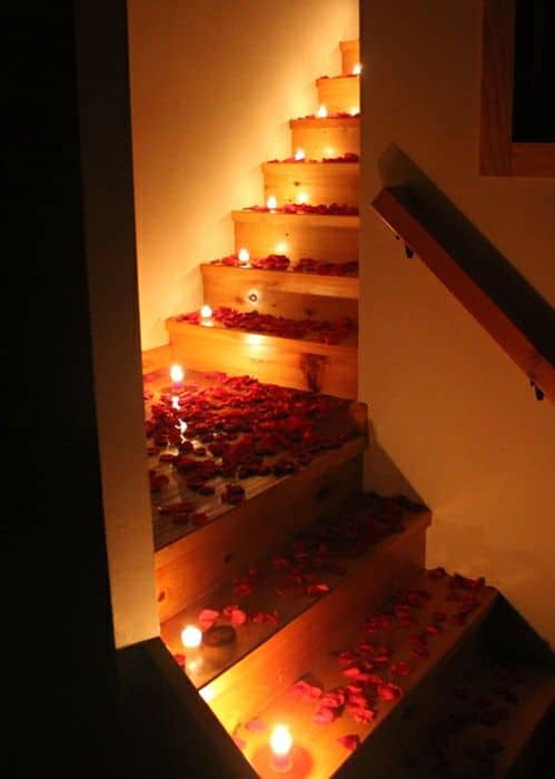 Romantic staircase decoration with flowers and candles