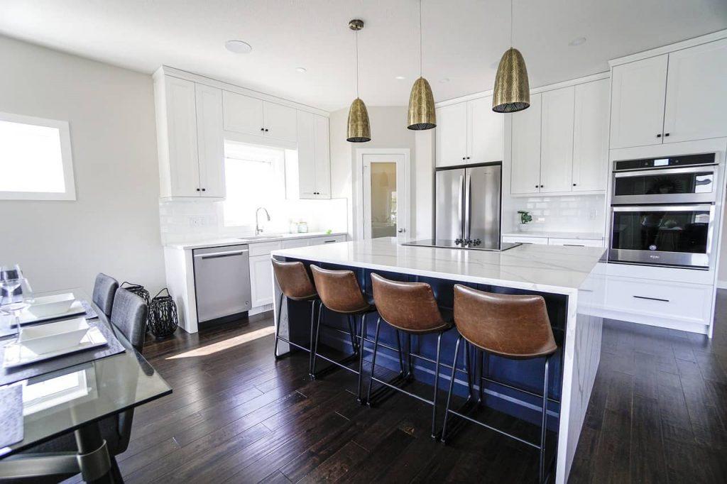 white kitchen cabinets in well decorated kitchen